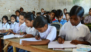 School children writing inside the classroom at a government-run school during the International Literacy Day in Allahabad. According to Indian Census 2011, the literacy rate in is 74.04 percent of the total population aged seven and above, though the government has made a law that every child under the age of 14 should get free education, the problem of illiteracy is still at large especially in the rural areas. (Photo by Prabhat Kumar Verma / Pacific Press) (Photo by Pacific Press/Corbis via Getty Images)